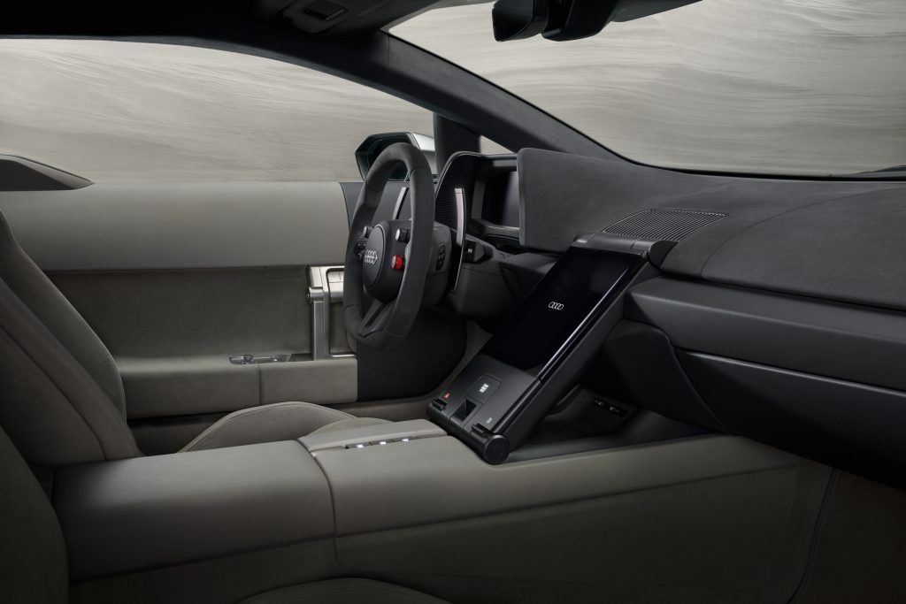 Diseño interior del habitáculo del nuevo Audi Nuvolari con acabados minimalistas, perfecto para la importación de coches en Andorra con Importwagen.
