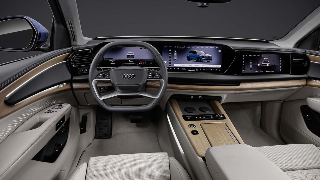 Salpicadero y puesto de conducción del nuevo SUV de lujo Audi Q7 con pantallas digitales y acabados en madera, analizado por Importwagen en Andorra.